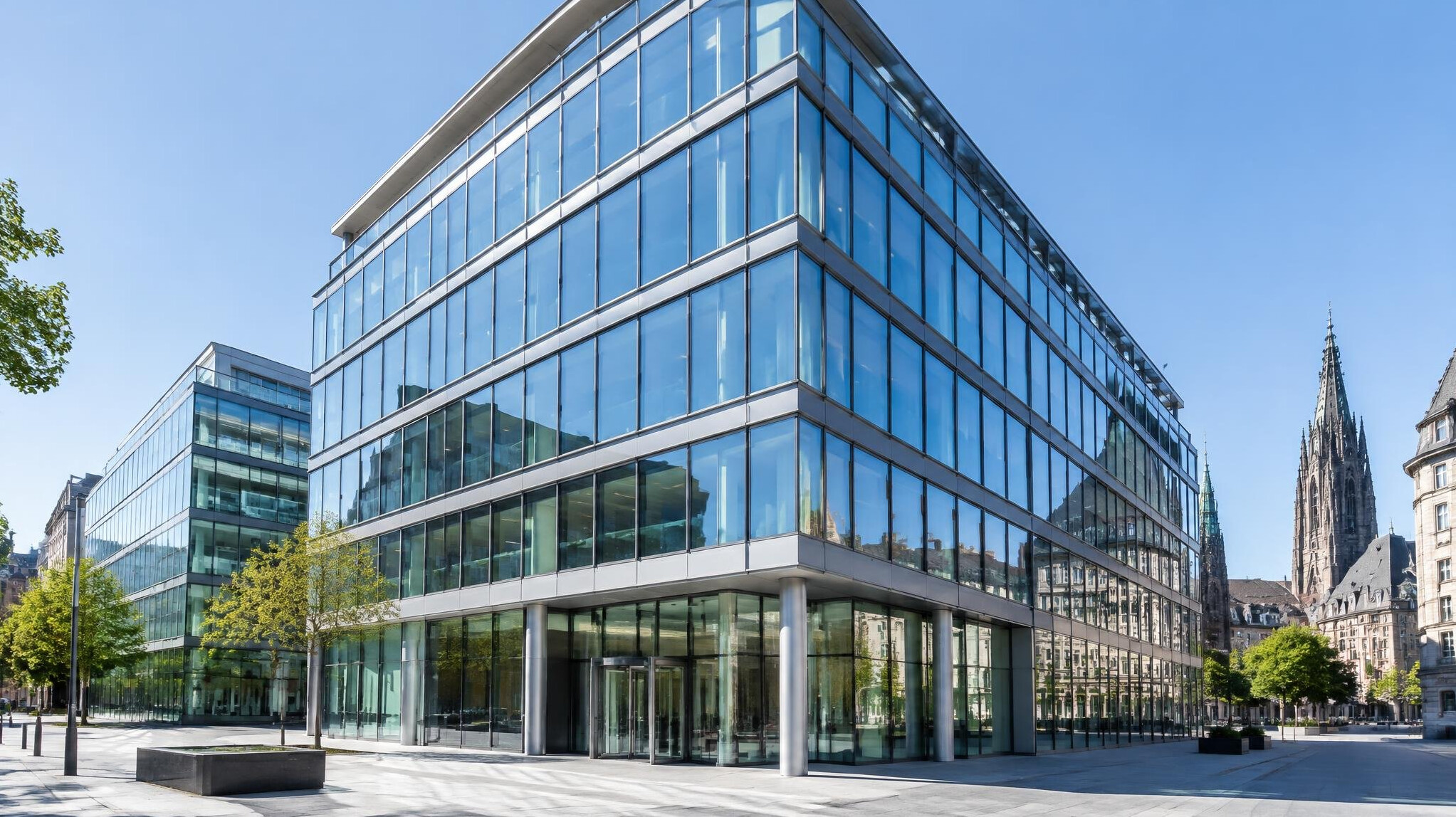 Modern glass office building exterior in a European city
